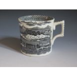 A Nineteenth Century Mug by F.C. & Co.decorated with a black transfer scene of the steam