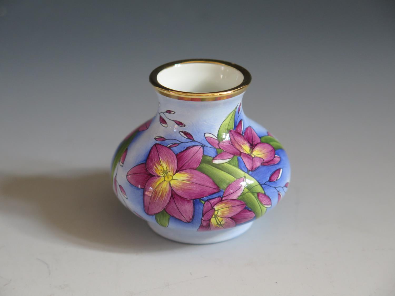 A Modern Moorcroft Enamel Purple Floral Vase, 5cm, dated 98 and initialled MCC 99