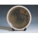 A John Leach Muchelney Pottery Stoneware Plate, impressed MUCHELNEY to base, 9" diam.