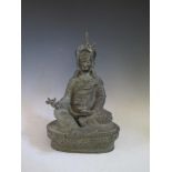 A Chinese Bronze Seated Budhavista, 34cm high