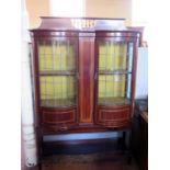 An Edwardian Mahogany and Inlaid Display Cabinet by Henry Barker of Nottingham with twin bow fronted