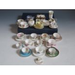 A Large Collection of Minitaure Tea Cups with saucers and other miniatures, mostly Crown