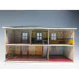 A Mettoy Tinplate Dolls House with Living Room, Kitchen, 2 Bedrooms and a Bathroom. (approx 48.