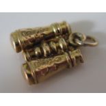 A 9ct Gold Charm in the form of a pair of binoculars, 0.4g, 15mm overall length