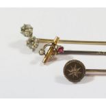 A 15ct Diamond Pin (1.7g), unmarked twin diamond pin and diamond and ruby pin (mark rubbed), 3g