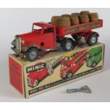 A Triang Minic Clockwork 72M Mechanical Horse and Brewery Trailer in red complete with the