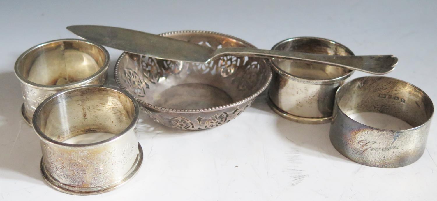 A Pair of Edward VII Silver Napkin Rings Sheffield 1907 P Ashberry & Sons, two other napkin rings,