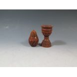 A 19th Century Carved Coquilla Nut Egg Cup 85mm and pear shaped box with screw top 65mm