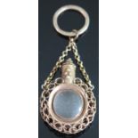 A Georgian Miniature Unmarked Gold 'Scent Bottle' Locket on chain with hinged crystal centre and top