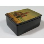 A 19th Century Russian Papier Mache Stamp Box painted with St. Basil's Cathedral, 56x43mm