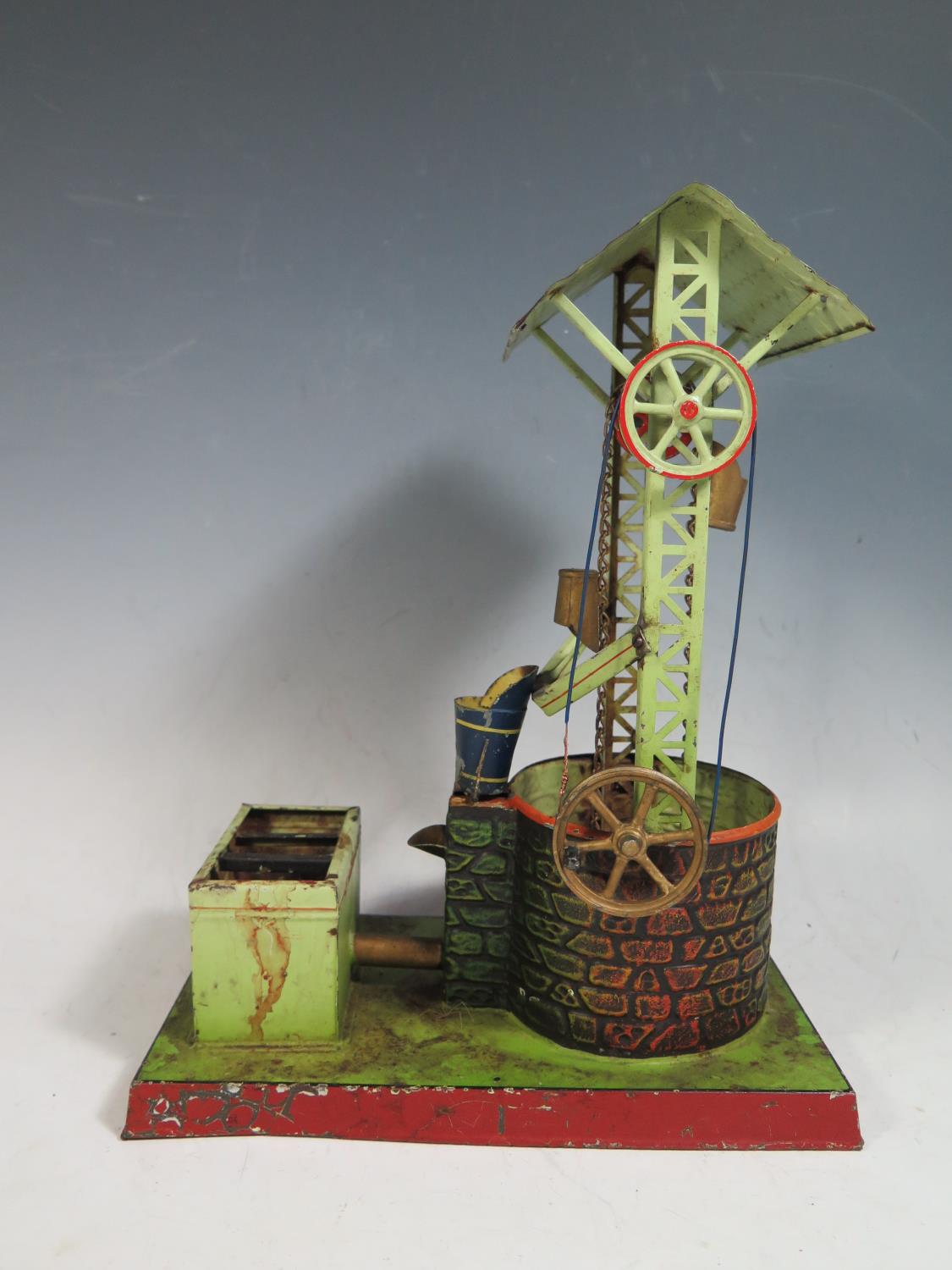 A Doll et Cie (German) Tinplate Steam Powered Water Well Circa 1930