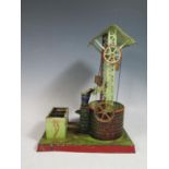 A Doll et Cie (German) Tinplate Steam Powered Water Well Circa 1930