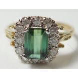 A Modern 18ct Yellow Gold, Emerald and Diamond Ring, size P.5, 4.4g, EEW 1.75ct