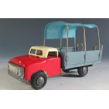 A Chinese Made Tinplate Canopied Truck with Retracting Ladder in Red, Cream and Blue-Grey.