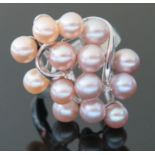 A Modern 18K White Gold, Pink Pearl and Diamond Dress Ring, size Q, 7.8g, ring head 29mm long