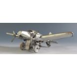 A 1940's German Hammerer & Kuhlwein Tinplate Plane in Silver Livery "TRO 345", motor works but is