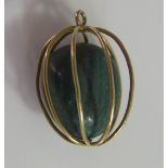 An Unmarked Gold Charm in the form of a basket containing a malachite sample, 4.4g, 20mm
