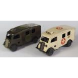 A Triang Minic Clockwork 75M Ambulance and one other repainted both with working motors.