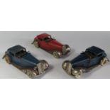 Three Triang Minic 18M Vauxhall Town Coupe Cars in blue and red with chrome. One motor needs