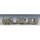 A Small Unusual Early 20th Century Penny Toy 3 Piece Train (12.cm approx overall length).