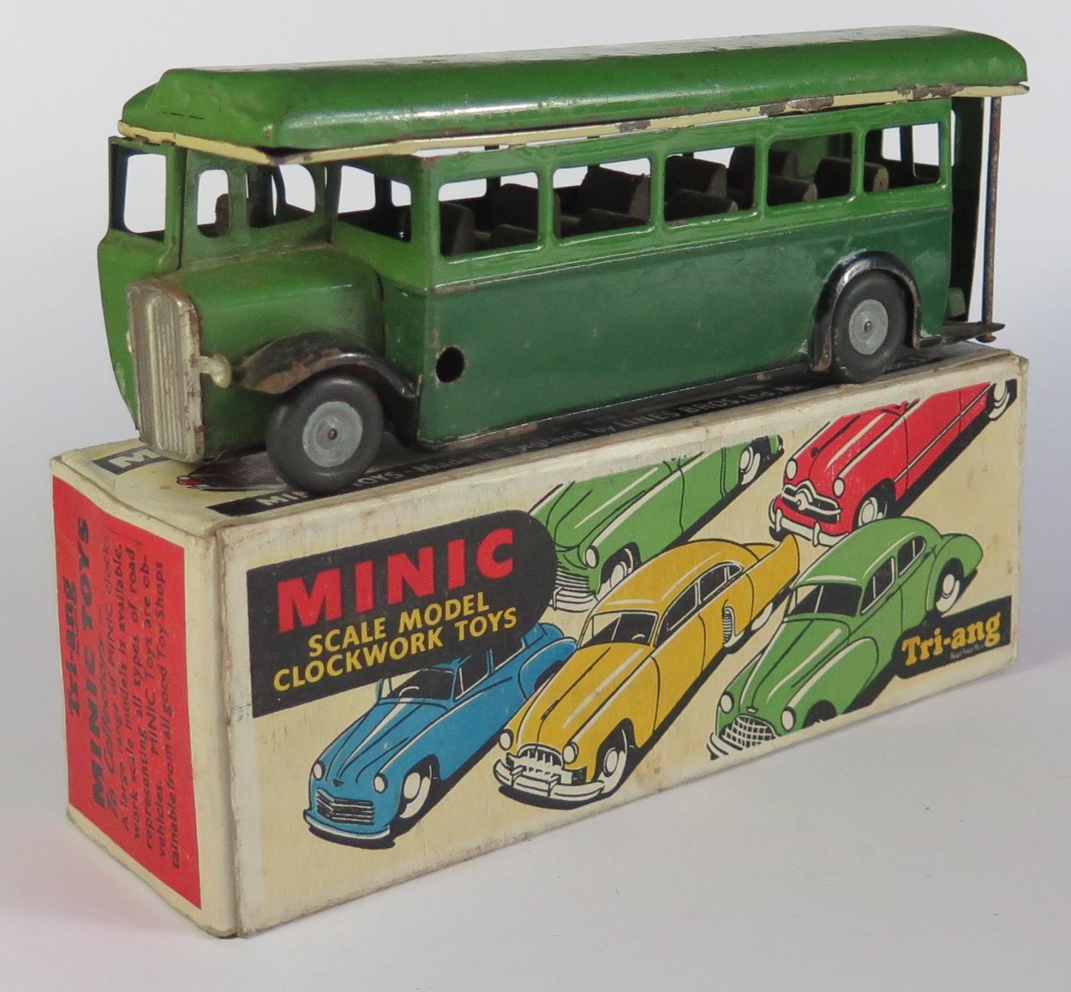 A Triang Minic Clockwork 52M Single Deck Bus in green and dark green. Working Motor in good complete