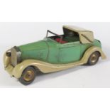 A Scarce Triang Minic 50ME Rolls Royce Sedanca in light green and beige with red plastic. The
