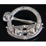 An Irish White Metal Celtic Brooch, the back marked West & Son College Green Dublin Registered Decr.