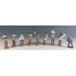 An Eight Piece Elastolin Marching Band Made by Leyla, Germany (one broken).