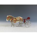 An 1912 Gibbs Walking Horse/Pony & Sulky Racer Cart (18cm approx).