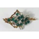 A 14K Yellow and White Gold Brooch set with translucent vivid green stones, 61mm, 15.1g