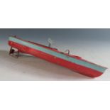A Triang Clockwork Tinplate Boat in Red and Blue, working motor(26cm approx).