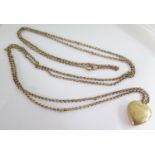 A 9ct Gold Guard Chain 130cm and 9ct heart locket, 29.3g