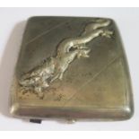 A Chinese Silver Cigarette Case embossed with dragon, the gilt interior stamped TSUNTSUN and with