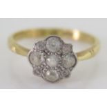 An 18ct Yellow Gold and Platinum Diamond Cluster Ring, size M, 2.7g