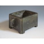 A Chinese Bronze Censer with lug handles, four character mark to base, 15(w)x9(d)x6.7(h)cm. Re-
