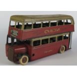 An Early Triang Minic Clockwork 60M Double Deck Bus in maroon and grey with working motor.