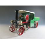 A Mamod SW1 Steam Wagon Live Steam Engine in Green, White and Red (Not Tested).