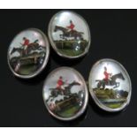 A Pair of 14ct Gold Sussex Crystal Cufflinks decorated with four scenes of a hunter with rider