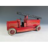 A Chad Valley Ubuilda Tinplate Fire Engine (21cm approx), motor works.
