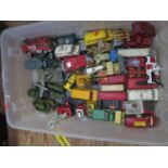 A Collection of Play Worn Dinky Toys including Army Vehicles, Fire Engines, Vans, Police Vans etc.