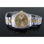 A Ladies Rolex Oyster Datejust in gold and steel, with box and papers dated 09 APR 1996, model no.