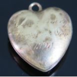 A George IV Unmarked Gold Heart Locket with hinged crystal interior, inscribed and dated 1829,