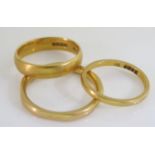 Three 22 ct Wedding Bands, sizes N, J and G.5, 9.2g