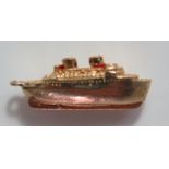 A 9ct Gold Charm in the form of a passenger liner, 3.2g, 22mm long