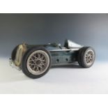 An Unusual Three Spring Driven Race Car. The front tyres are marked Meccano however I do not think
