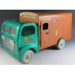 A Large Triang Toys Tinplate Horse Transporter in Metallic Green and Orange-Brown (47cm approx).