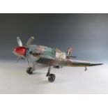 A Modern Tin Toy Replica of a Spitfire (46cm approx wingspan).