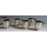 A Set of Six French Silver Spirit Tots with applied bird handle and embossed foliate and insect