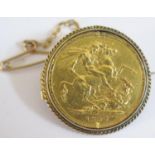 An 1887 Gold Sovereign Brooch, mount not marked, 10.6g gross