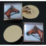 A Pair of 14K Yellow Gold Sussex Crystal Cufflinks decorated with two horses heads, 14mm sq. 10.3g